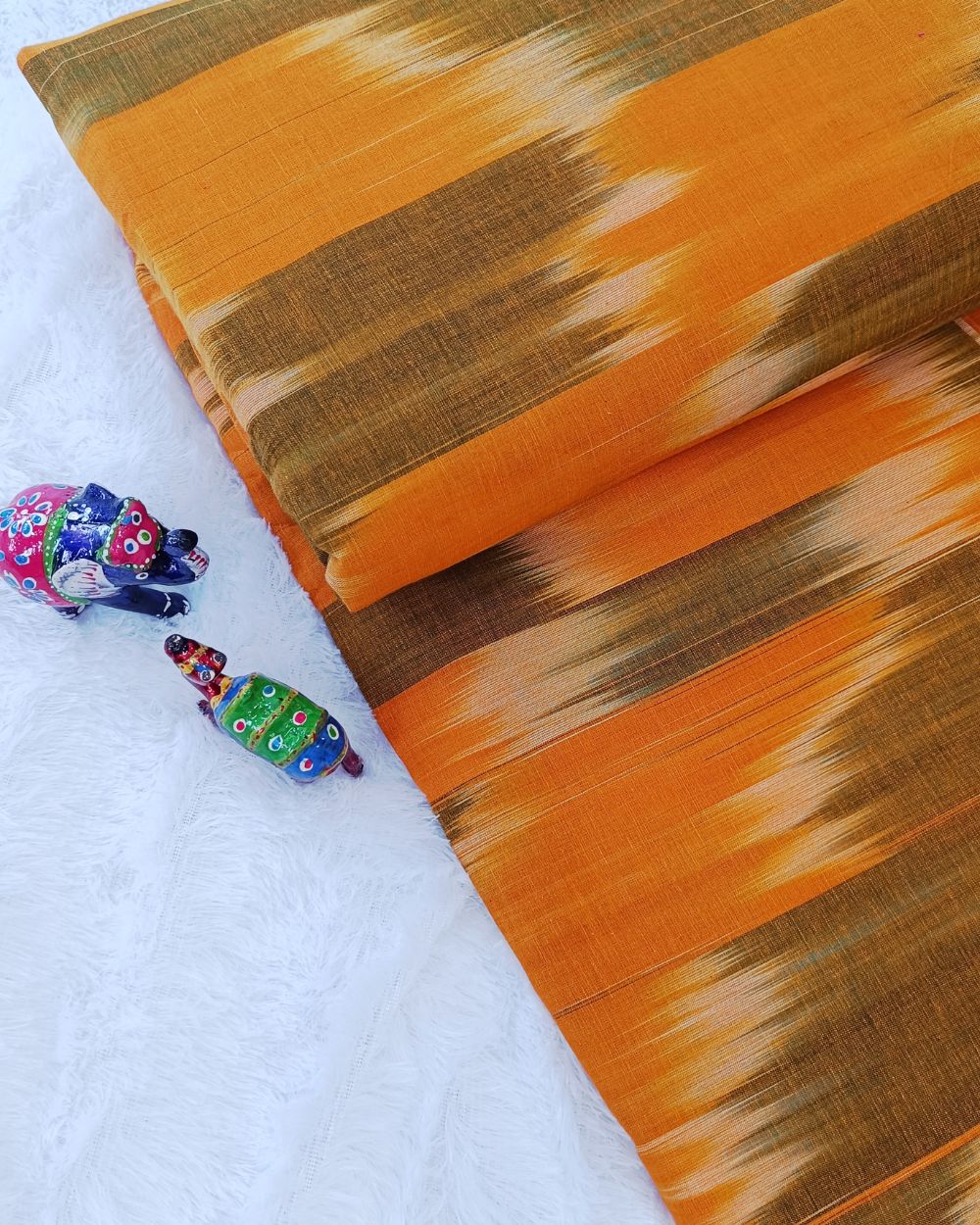 Woven Pure Cotton Ikat Orange Colour 42 Inches Width
