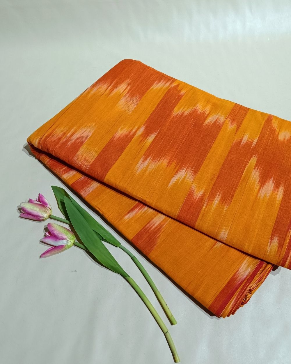 Woven Pure Cotton Ikat Dusty Orange Colour 42 Inches Width
