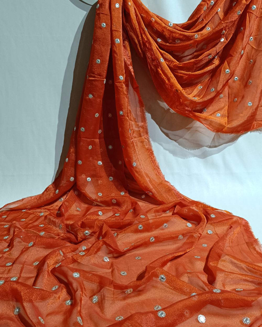 Premium NC Moss with Butti Work Burnt Orange Colour 44 Inches Width