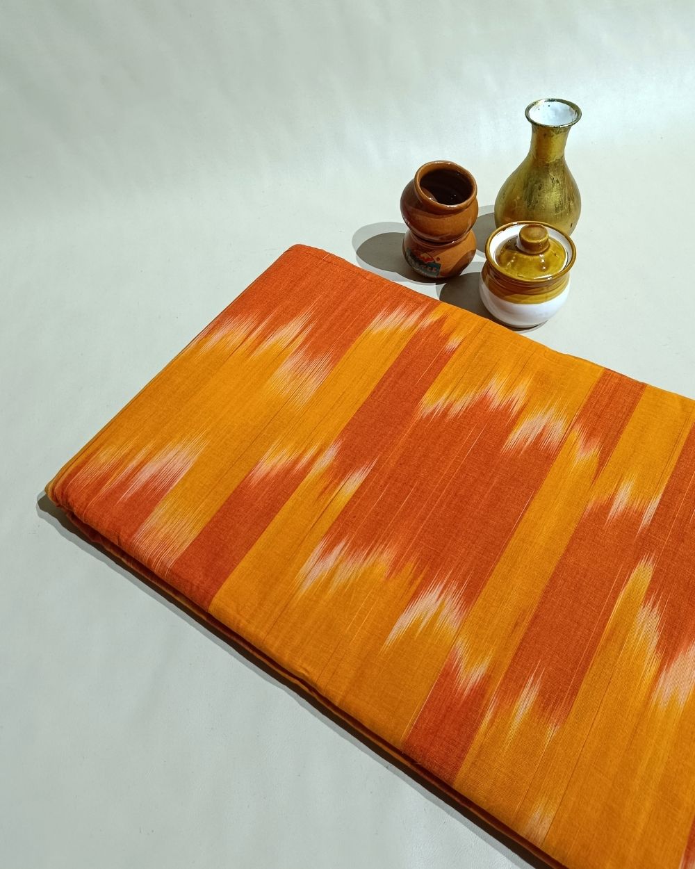 Woven Pure Cotton Ikat Dusty Orange Colour 42 Inches Width